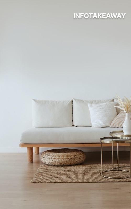 Sofa with cushions against a white wall